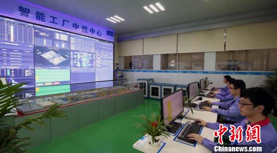 家电巨头加速 机器换人 美的广州建智能化工厂